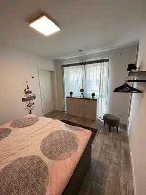 Ein Bett oder Betten in einem Zimmer der Unterkunft Haus am Brunnen Wohnung 1