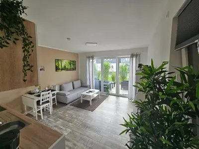 Ein Sitzbereich in der Unterkunft Haus am Brunnen Wohnung 1