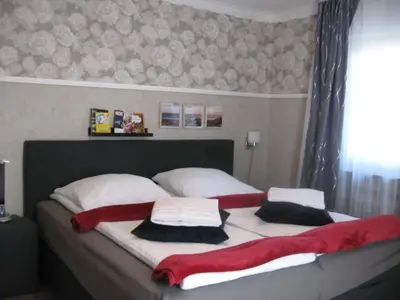 Ein Bett oder Betten in einem Zimmer der Unterkunft Diamanthaus 3 Koblenz