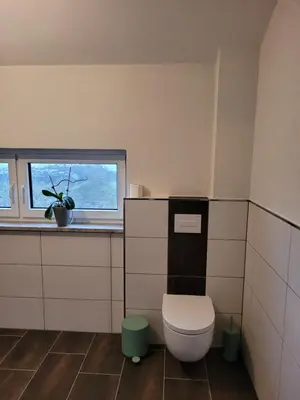 Ein Badezimmer in der Unterkunft Beim Eifelfranken