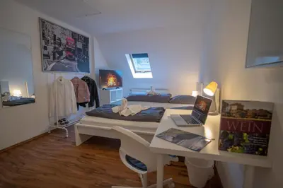 Ein Bett oder Betten in einem Zimmer der Unterkunft 4-Zimmer Haus, 2-Bäder 140qm bis zu 11 Personen