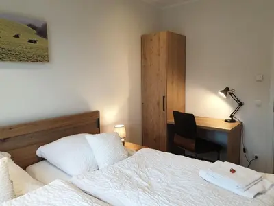 Ein Bett oder Betten in einem Zimmer der Unterkunft Ferienwohnungen am Aeppelsberg