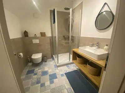 Ein Badezimmer in der Unterkunft Turteltäubchen am Taubenhaus Residenz Moselliebe