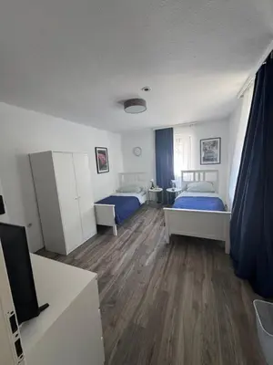 Ein Bett oder Betten in einem Zimmer der Unterkunft Gasthaus L&A Kunz