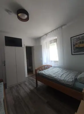 Ein Bett oder Betten in einem Zimmer der Unterkunft Gasthaus L&A Kunz