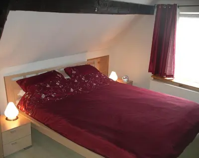 Ein Bett oder Betten in einem Zimmer der Unterkunft Ferienhaus Anna Maria