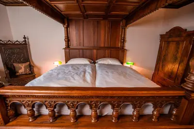 Ein Bett oder Betten in einem Zimmer der Unterkunft Burg Gutenfels