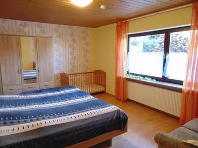 Ein Bett oder Betten in einem Zimmer der Unterkunft Ferienwohnung Astor zwischen Rhein und Mosel