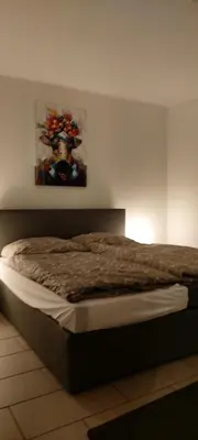 Ein Bett oder Betten in einem Zimmer der Unterkunft Ferienwohnung KaMa