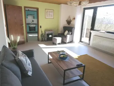 Ein Sitzbereich in der Unterkunft Ferienwohnung Christine mit Sauna und Whirlpool