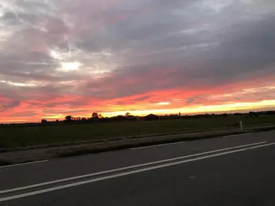 Blick auf den Sonnenuntergang/Sonnenaufgang von der Ferienwohnung aus oder aus der Nähe