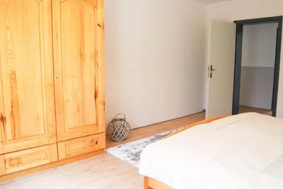 Ein Bett oder Betten in einem Zimmer der Unterkunft Gästehaus an der Moseltherme