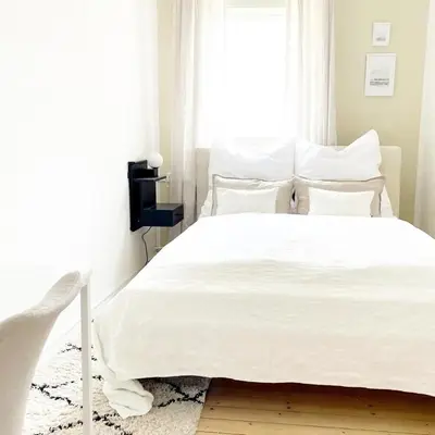 Ein Bett oder Betten in einem Zimmer der Unterkunft Friends and Family Leiwen