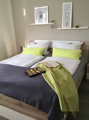 Ein Bett oder Betten in einem Zimmer der Unterkunft Ferienwohnung Loretta