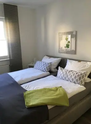 Ein Bett oder Betten in einem Zimmer der Unterkunft Ferienwohnung Loretta