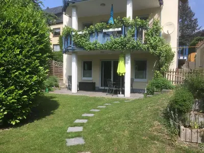 Ein Garten an der Unterkunft Ferienwohnung Sponheim