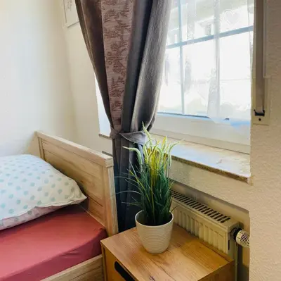 Ein Bett oder Betten in einem Zimmer der Unterkunft Ferienwohnung in Binger Stadtmitte