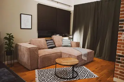 Ein Sitzbereich in der Unterkunft Stilvolles City-Loft mit privatem Whirlpool
