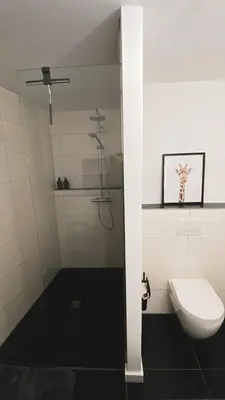 Ein Badezimmer in der Unterkunft Stilvolles City-Loft mit privatem Whirlpool