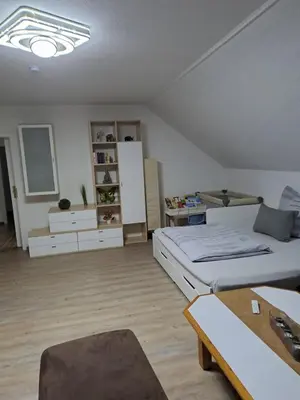 Ein Bett oder Betten in einem Zimmer der Unterkunft Ferienwohnung Dieblich