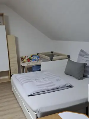 Ein Bett oder Betten in einem Zimmer der Unterkunft Ferienwohnung Dieblich