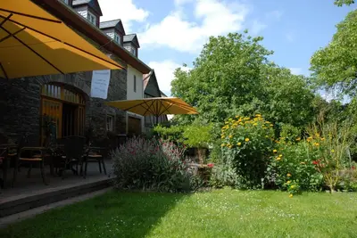 Ein Garten an der Unterkunft Juffer Flair Restaurant Gästehaus