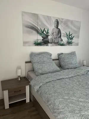 Ein Bett oder Betten in einem Zimmer der Unterkunft Ferienwohnung / Haus Hunsrückblick
