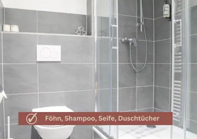 Ein Badezimmer in der Unterkunft New York Apartment - für Freunde & Familien, stadtnah, Parkplatz, E-Ladestation, Gitterbox für Fahrräder, Fitnessstudio, digitale Gästemappe mit Restaurant- und Unternehmenstipps