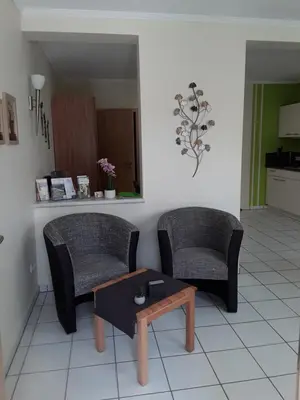 Ein Sitzbereich in der Unterkunft Ferienappartement Wagner