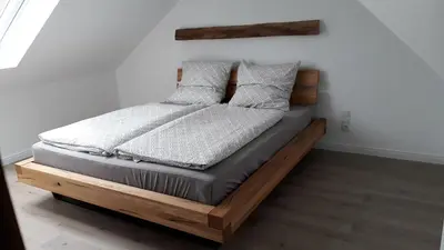 Ein Bett oder Betten in einem Zimmer der Unterkunft Leeseits