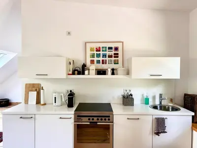Küche/Küchenzeile in der Unterkunft Ferienwohnung Weingut Villa Huesgen am Mönchhof