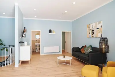 TV/Unterhaltungsangebot in der Unterkunft Design Apartment mit kostenfreiem Garagen Parkplatz im Zentrum