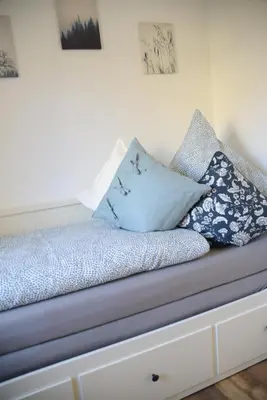 Ein Bett oder Betten in einem Zimmer der Unterkunft Ferienwohnung Die Alte Schule