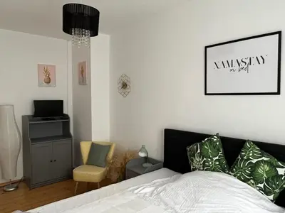 Ein Bett oder Betten in einem Zimmer der Unterkunft Stilvolle Altstadtwohnung mit 2 Schlafzimmern