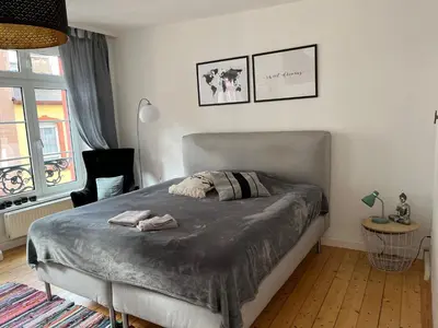 Ein Bett oder Betten in einem Zimmer der Unterkunft Stilvolle Altstadtwohnung mit 2 Schlafzimmern