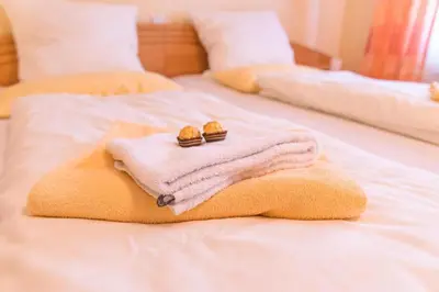 Ein Bett oder Betten in einem Zimmer der Unterkunft Ferienwohnung 4 Am Petersberg