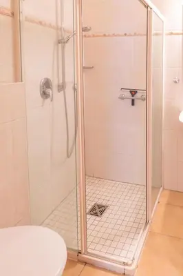 Ein Badezimmer in der Unterkunft Ferienwohnung 4 Am Petersberg
