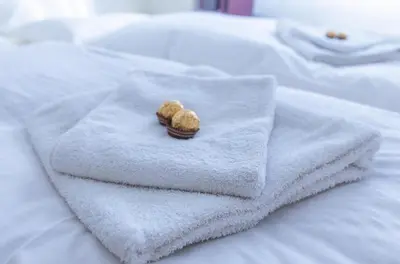 Ein Bett oder Betten in einem Zimmer der Unterkunft Ferienwohnung 3 Am Petersberg