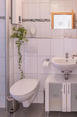 Ein Badezimmer in der Unterkunft Ferienwohnung 3 Am Petersberg