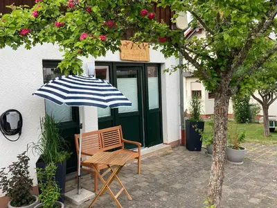 Ein Garten an der Unterkunft Ferienwohnung Zum Eifelelch