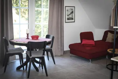 Ein Sitzbereich in der Unterkunft Ferienwohnungen und Gästezimmer Friedrichs