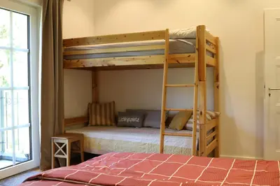 Ein Bett oder Betten in einem Zimmer der Unterkunft Ferienwohnungen und Gästezimmer Friedrichs