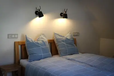 Ein Bett oder Betten in einem Zimmer der Unterkunft Ferienwohnungen und Gästezimmer Friedrichs