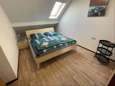 Ein Bett oder Betten in einem Zimmer der Unterkunft Relaxen am Ring Fewo 2