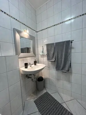 Ein Badezimmer in der Unterkunft O&W Ferienzimmer am Nürburgring, Quiddelbach