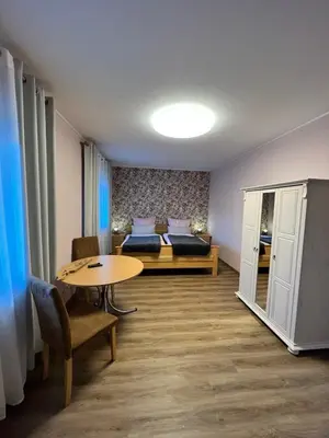 Ein Sitzbereich in der Unterkunft O&W Ferienzimmer am Nürburgring, Quiddelbach