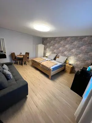 Ein Bett oder Betten in einem Zimmer der Unterkunft O&W Ferienzimmer am Nürburgring, Quiddelbach