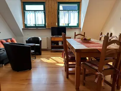 Ein Sitzbereich in der Unterkunft Ferienwohnung Zur Scheune