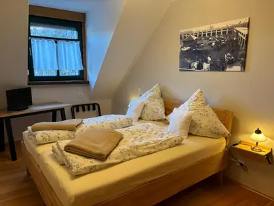 Ein Sitzbereich in der Unterkunft Ferienwohnung Zur Scheune