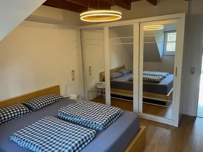 Ein Bett oder Betten in einem Zimmer der Unterkunft Wundervolle Aussicht in bester Lage auf 